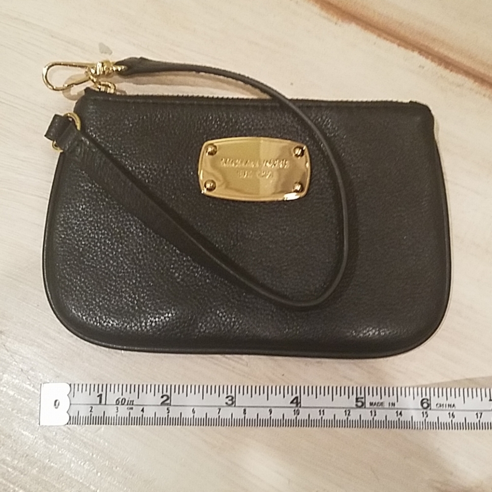 Michael Kors black wristlet 4 inch x 6 inch